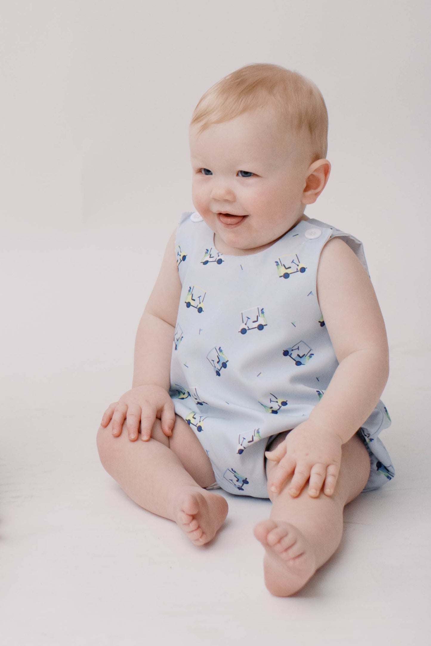 Baby boys blue golf romper playsuit.
