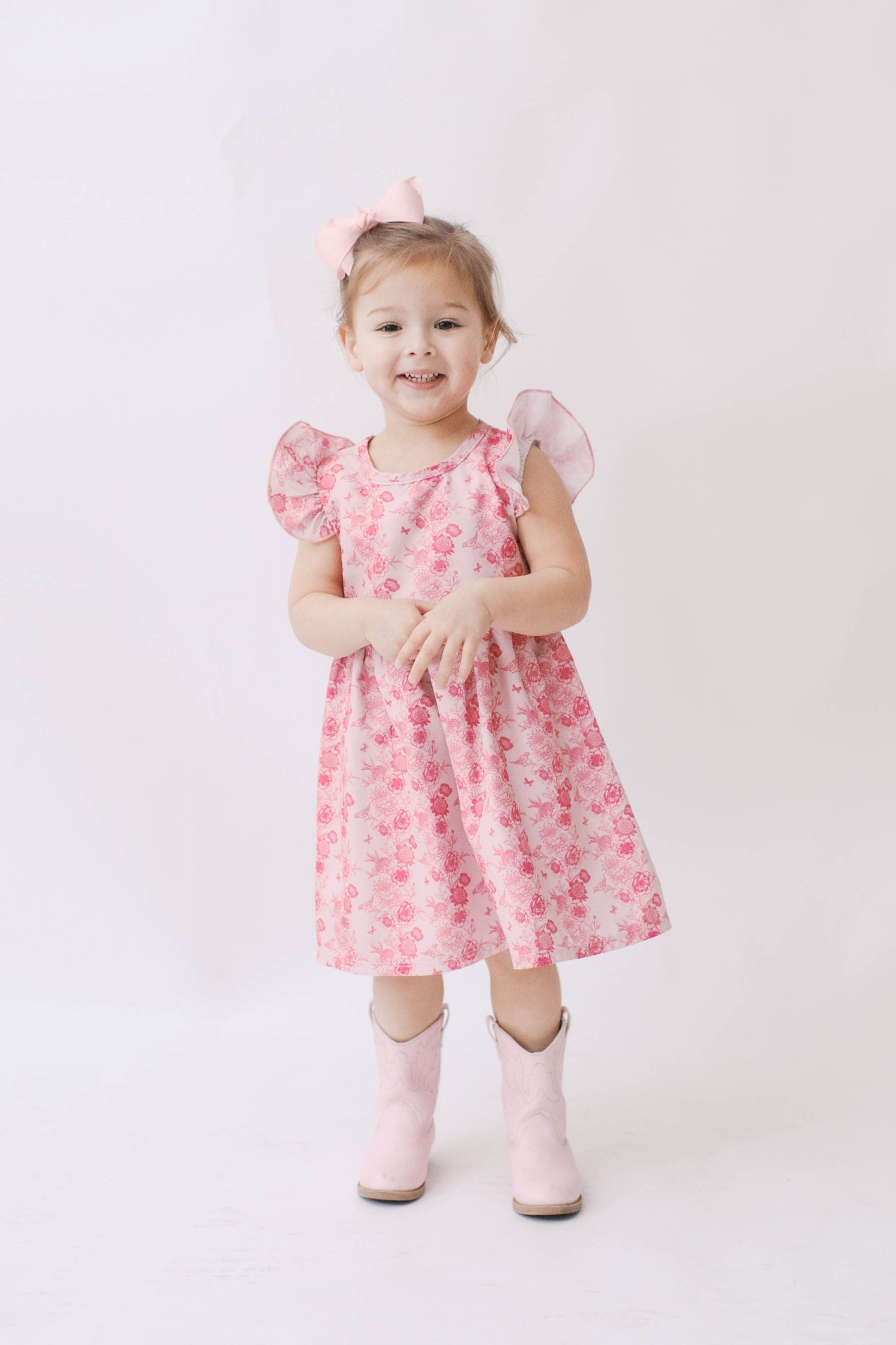 Girls pink toile dress.